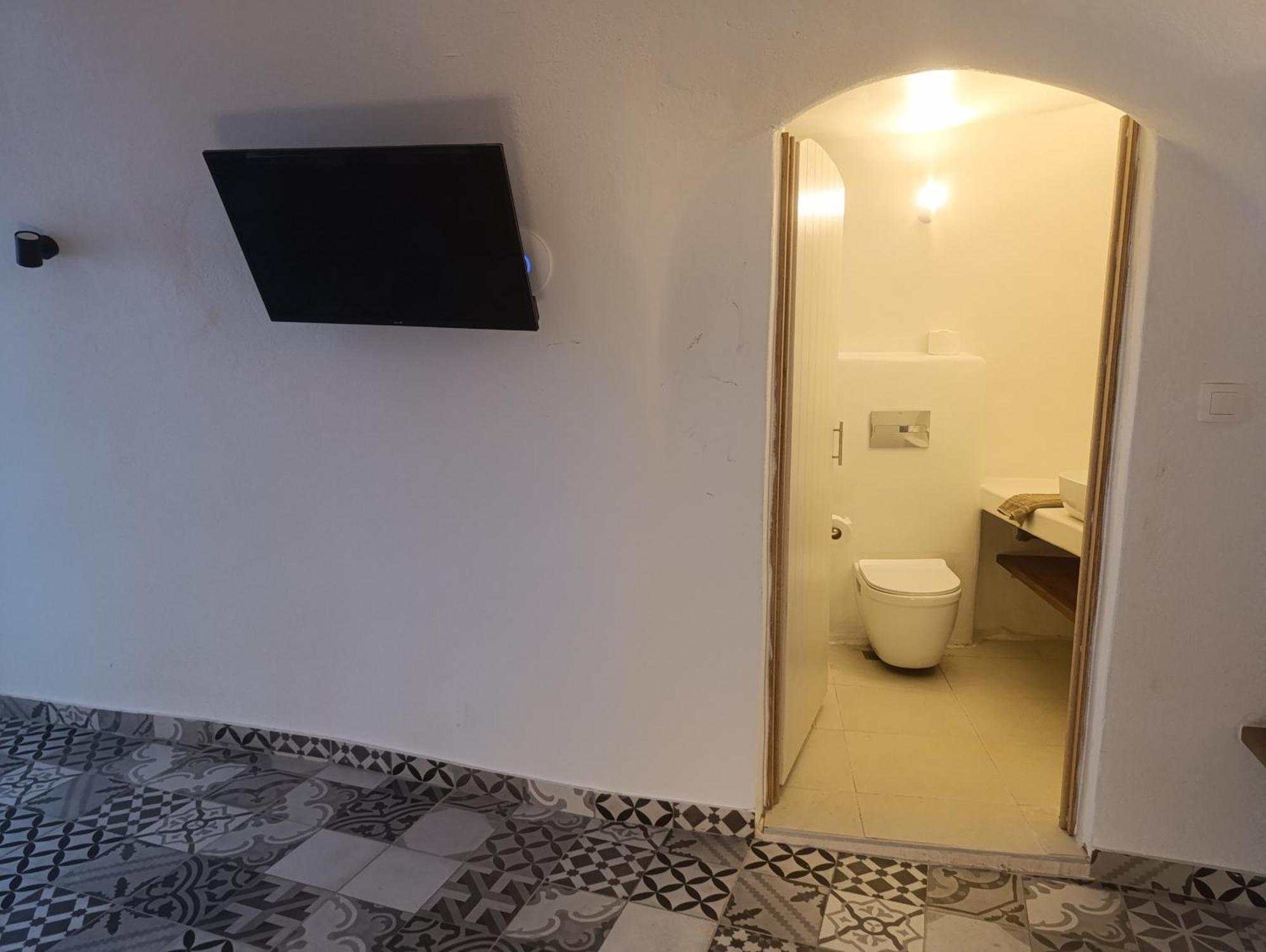 Cycladic Center Cave Rooms Fira (Santorini) Exterior foto